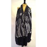 Neisha Crosland - A dark grey silk satin devore stole with spiral foliate design (with tags), and