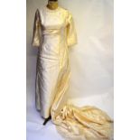 Hartnell, 26 Bruton St. W1 - A 1970s empire-line style ivory shantung silk effect wedding gown,