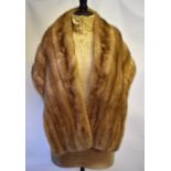 A blond shadowed mink stole and a dark brown shadowed mink stole (2) Blond stole - lining ripped