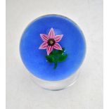 Paul Ysart paperweight - Central lampwork pink flower, stem and leaves, blue ground, 'H' cane to