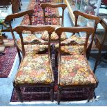 A set of five Regency mahogany dining side chairs, with shaped bar backs and well moulded horizontal