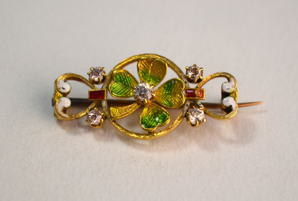 An Edwardian yellow gold and polychrome enamel shamrock brooch set with five small diamonds, 2.5 x - Image 4 of 5