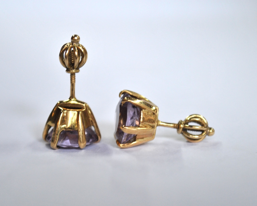 A pair of circular pale amethyst stud earrings, yellow metal claw set - Image 3 of 4