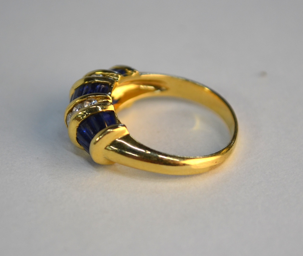 A sapphire and diamond bombe style ring, set baguette sapphires and brilliant cut diamonds, in - Image 3 of 6