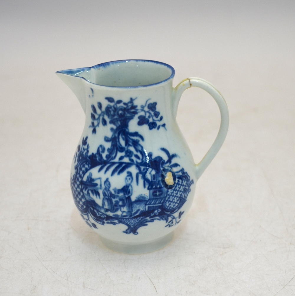 An 18th century Worcester blue and white sparrow beak creamer decorated with the 'Woman, child and - Image 2 of 9