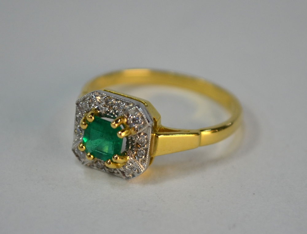 An emerald and diamond square cluster ring, 18ct yellow and white gold claw and millgrain setting,