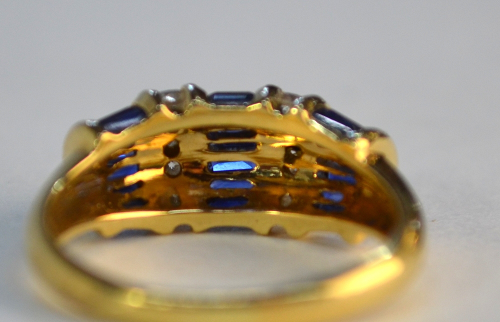 A sapphire and diamond bombe style ring, set baguette sapphires and brilliant cut diamonds, in - Image 4 of 6