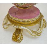 A pair of 19th century continental porcelain vases and covers, pink ground, lion mask and