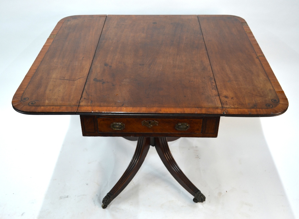 A Victorian cross-banded mahogany table with drop leaf top over a frieze drawer to end, raised on - Image 3 of 9