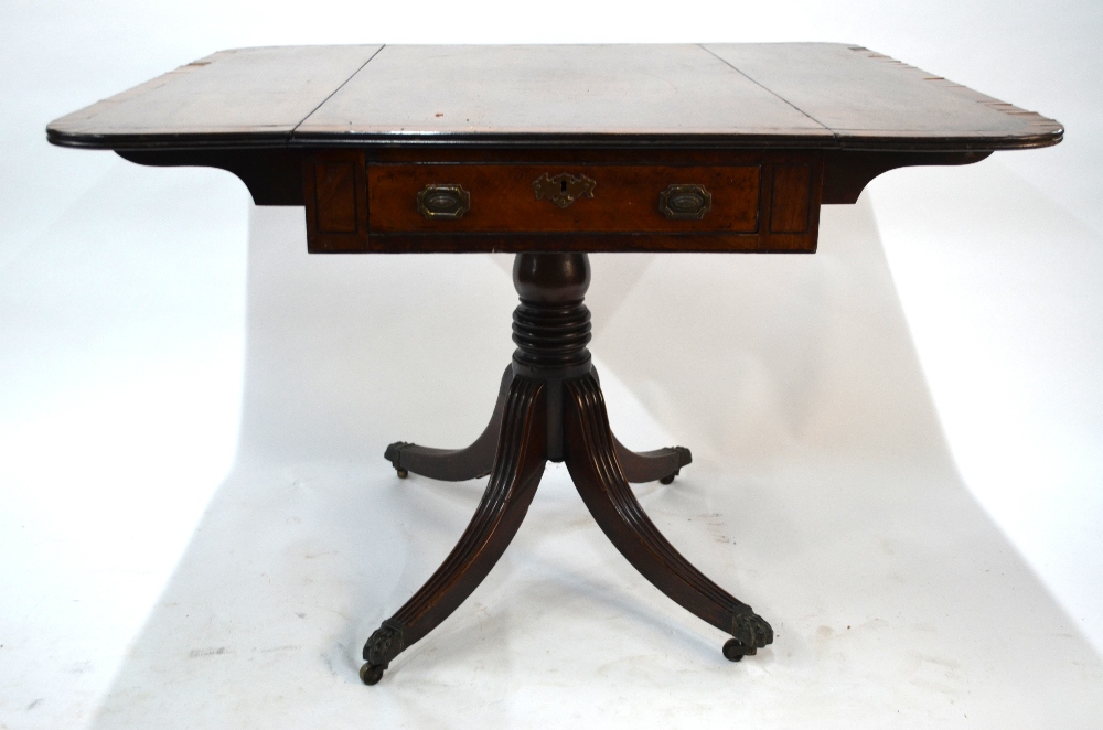 A Victorian cross-banded mahogany table with drop leaf top over a frieze drawer to end, raised on - Image 9 of 9