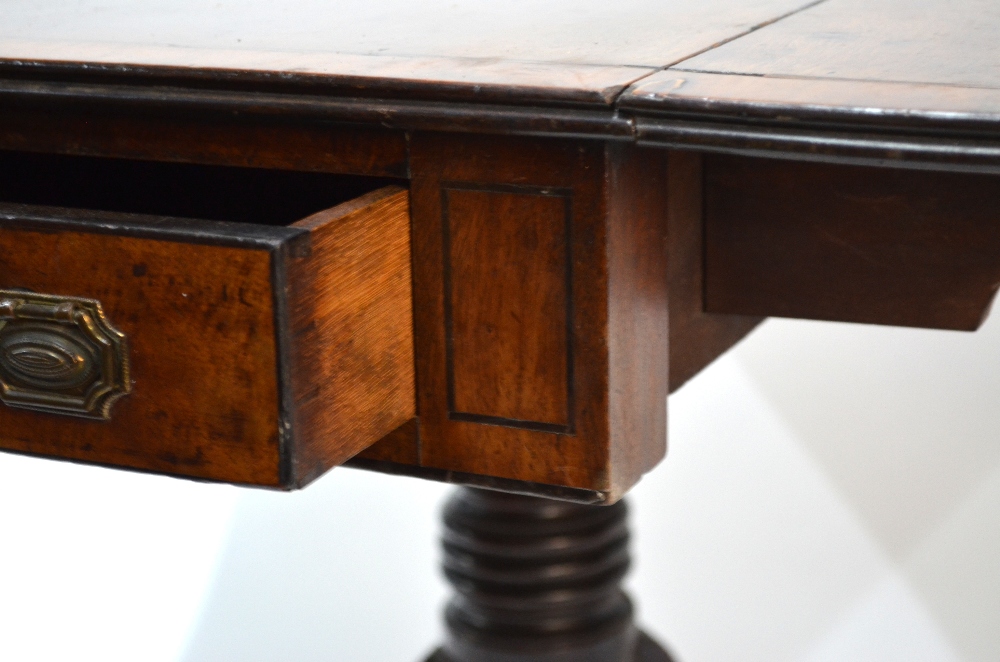 A Victorian cross-banded mahogany table with drop leaf top over a frieze drawer to end, raised on - Image 4 of 9