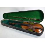 An antique violin with 36 cm two-piece flame back, in ebonised wooden case with bow No cracks or