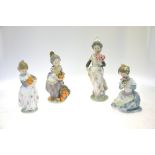 Four Lladro figures:  Miss Valencia, 1422, 1983, 19.5 cm high;  Young girl with oranges, 17.5 cm