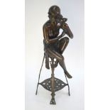 After J. E. Mir, brown-patinated bronze of a semi-clad female seated on a stool, 56 cm high