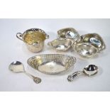 A set of four Chinese white metal pickle-dishes to/w an oval pierced silver bonbon dish, Sheffield