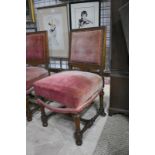 Set of four Victorian oak framed overstuffed dining chairs, raised on turned supports united by