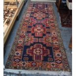 A Persian Brojerd runner, traditional geometric design, 330 x 112 cm