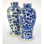 A Chinese associated pair of blue and white vases, decorated with dragons, 19 cm high; both with