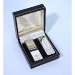 A Tiffany & Co money clip stamped '925', to/w a silver example, Harrison Brothers & Howson,