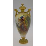 An early 20th century Royal Worcester twin handle vase and cover, hand painted by A. Shuck with a