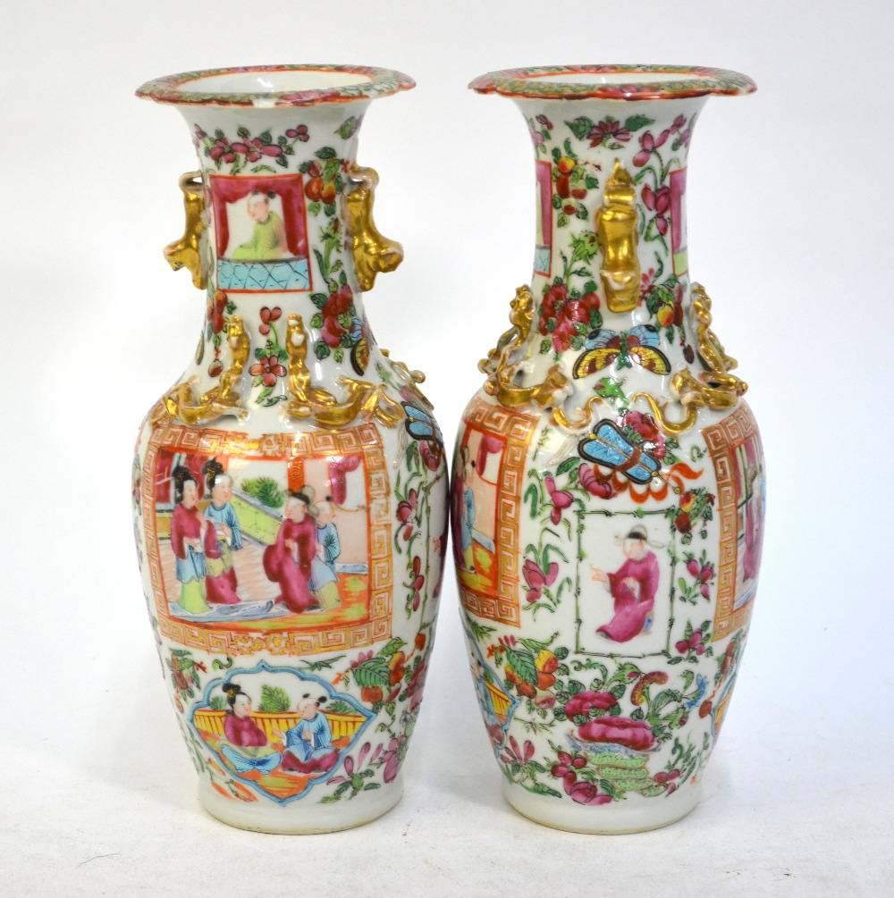 A pair of Canton famille rose vases; each one decorated with panels depicting Manchu/Chinese - Image 7 of 10