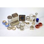 A selection of silver-mounted open salts, toilet jars, pepperettes, nursery photograph frame etc (