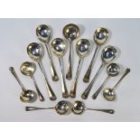 A heavy quality silver set of six Hanoverian rat-tail soup spoons, to/w six matching sundae spoons