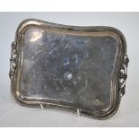 A Continental 900 grade trinket tray with beaded rim and pierced scrolling end handles, 10.3 oz,
