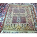 Persian Turkoman design rug, four central panels within repeating borders 160 x 120cm