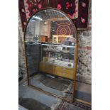 A large antique arch topped mirror within a slender walnut frame 162 cm h x 109 w