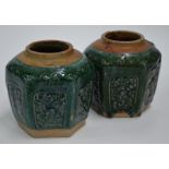 A pair of green glazed Vietnamese, or other Asian, stoneware monochromes; each one of hexagonal,