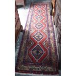 Persian Mazlegan runner, red ground geometric design, 279 x 78 cm