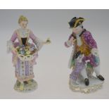 A Meissen porcelain figure of a flower seller, blue crossed swords to base, 14 cm high to/w a
