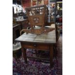 A 19th French pine table, the wide two plank top over a drawer to each end, raised on square legs