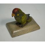 A Vienna cold-painted bronze green parrot, 6 cm high, on shagreen-clad base