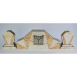 An Art Deco period three piece tri-tone marble clock garniture, the 8-day movement with silvered