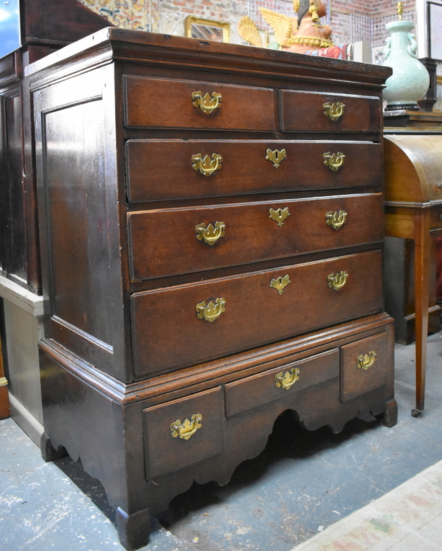 An 18th century oak chest on stand with two short, three long graduated drawers, the stand with - Image 4 of 4