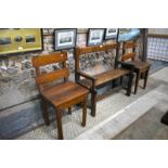 A tavern style oak short bench and pair of companion chairs, the bench 92 cm long (3)