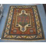 Caucasian geometric design rug, burnt orange ground with cream and blue stylised borders 148 x