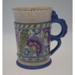AMENDED ESTIMATE A Charlotte Reid Crown Ducal over-sized tankard with double loop handle,