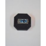 A Continental rectangular rose and white metal plaque ring set with pendeloque blue synthetic