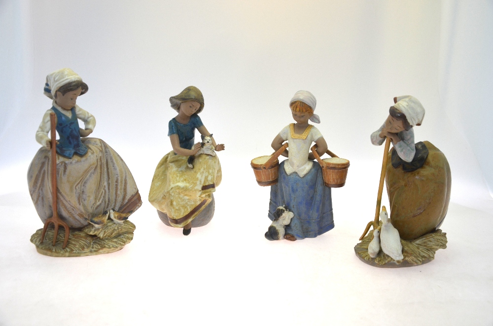 Four Lladro Gres figures:  Repose, 12169, 1986, 22 cm high;  Step Aside, 12254, 1992, 22 cm;