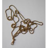 A long yellow metal box link chain with swivel bolt ring attached, stamped 9c, 154 cm long approx