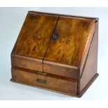 A Victorian slope front desk-top stationery cabinet, the interior with fabric calendar over