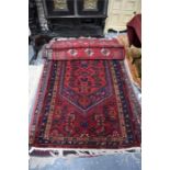 A Persian Hamadan rug, 215 x 105 cm