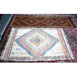 A Turkish Kelim diamond design runner (reduced in length) 250 x 75cm to/w Turkish cream ground Kelim