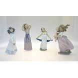 Five Lladro figures:  Playing Mom, 6681, Lladro Event figurine 2000, 24.5 cm high;  Trying on a