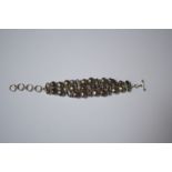 A white metal bracelet set black baroque pearl and mother-of-pearl, stamped 925