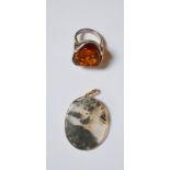 A white metal statement ring set amber, stamped 925, ring size Q/R to/w oval moss agate pendant in