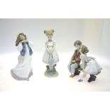 Three Lladro figures:  Ten and Growing, 7635, 10th Anniversary 1985-1995, 20 cm high;  Little School